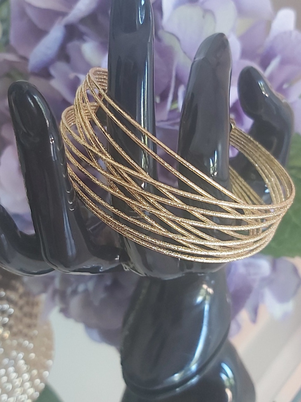 Multi-layered metal cuff bracelet